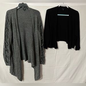 2 Torrid Sweater Cardigans. One is a 2x and one a 3x. Both fit like a 2x